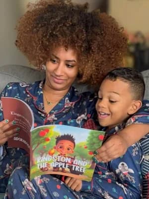 Joyce's child with their Adorabook