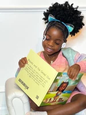 Carole's child with their Adorabook