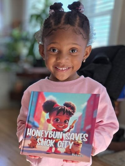 Young child reading their custom personalized storybook with their photo inside