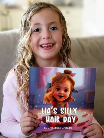 Kid proudly displaying their custom illustrated personalized children's book